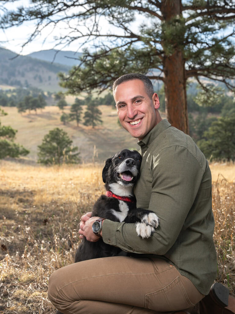 Heartwarming photo of Border collie leaning into man