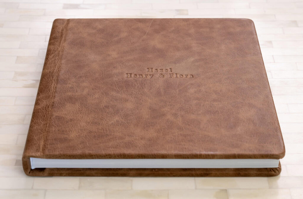 Custom leather photo album cover with embossed text